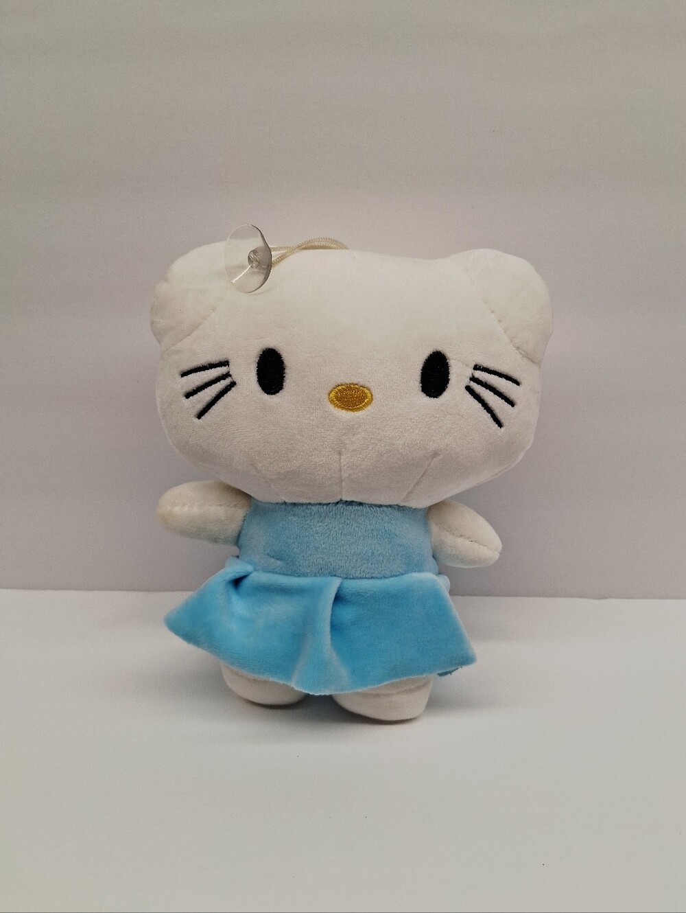 Kitty 7" White Plush Doll in Blue Dress Hanging String With Sunction Cup